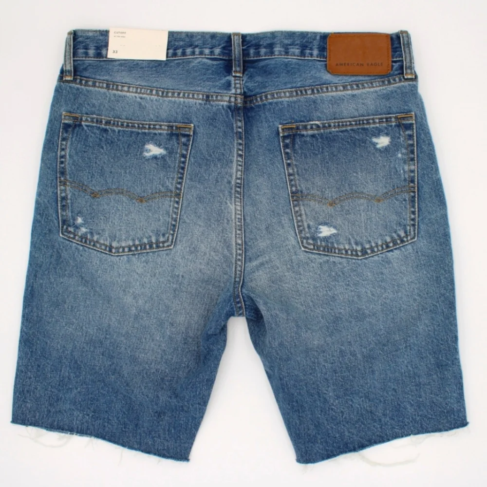 NWT American Eagle Men’s Cutoff Jean Shorts – Size 33 – Distressed Medium Blue - Picture 2 of 5